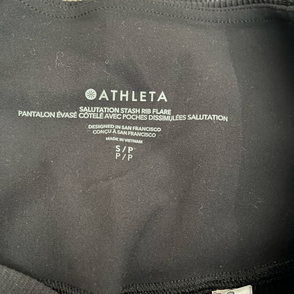 [S]Athleta Women's Black Salutation Stash Rib Flare Pants EUC Pockets - Picture 9 of 9